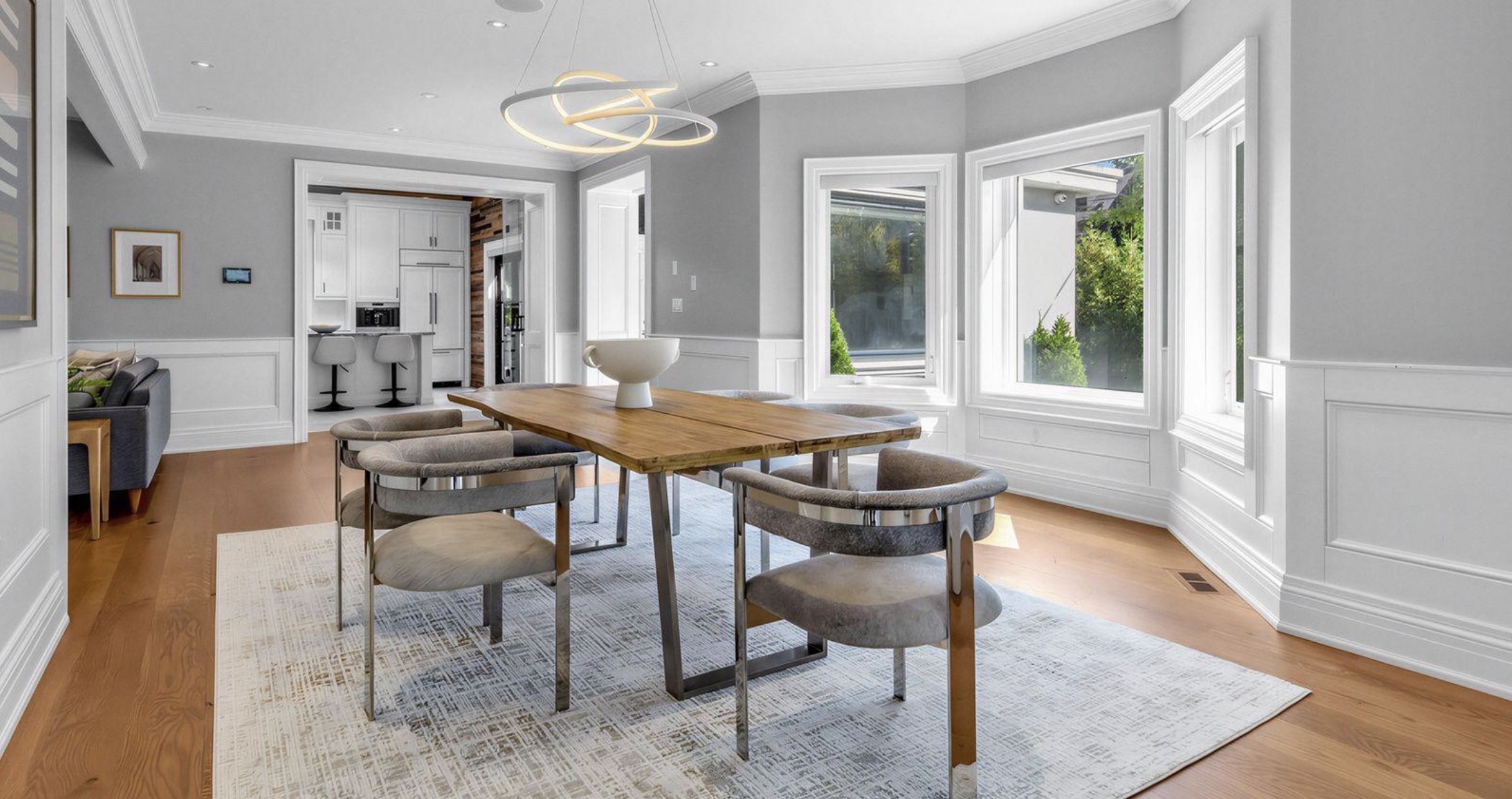 Dining room with grey walls and white trim